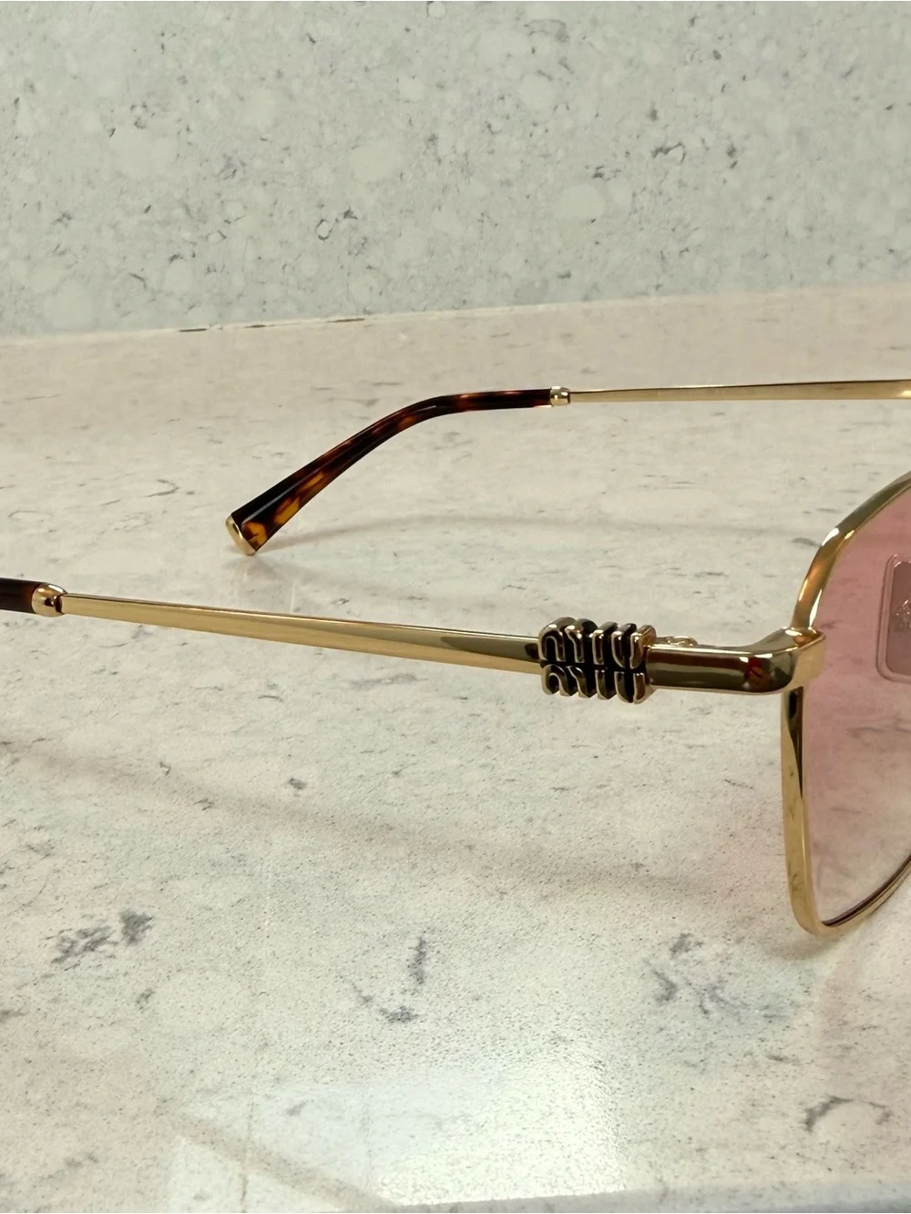 Miu Miu Gold Frame Sunglasses with Pink Gradient Lenses